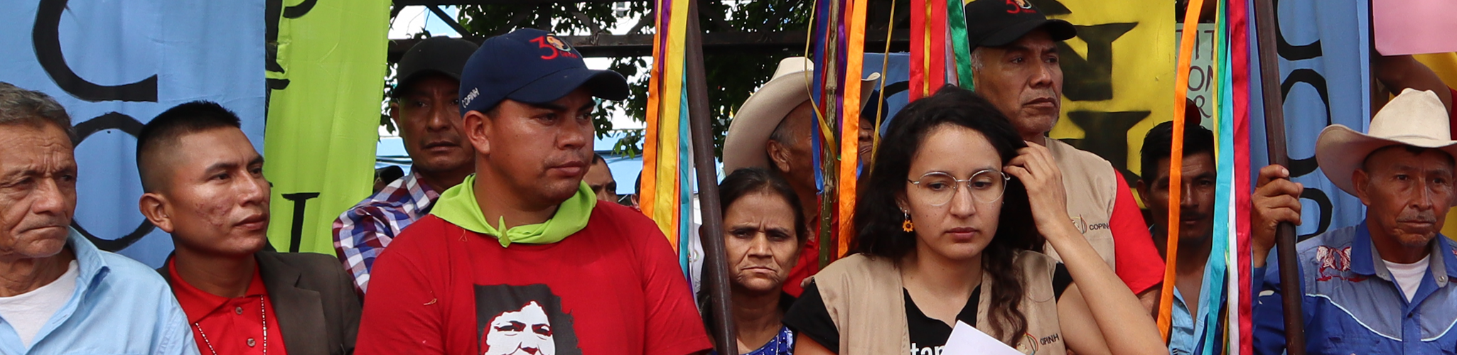 Group of people holding banners